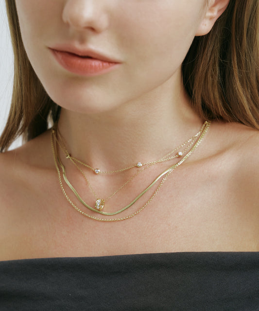 Yellow Gold | Lab Grown Diamond Bezel Station Necklace, 8 Stones, worn, layered with snake chain