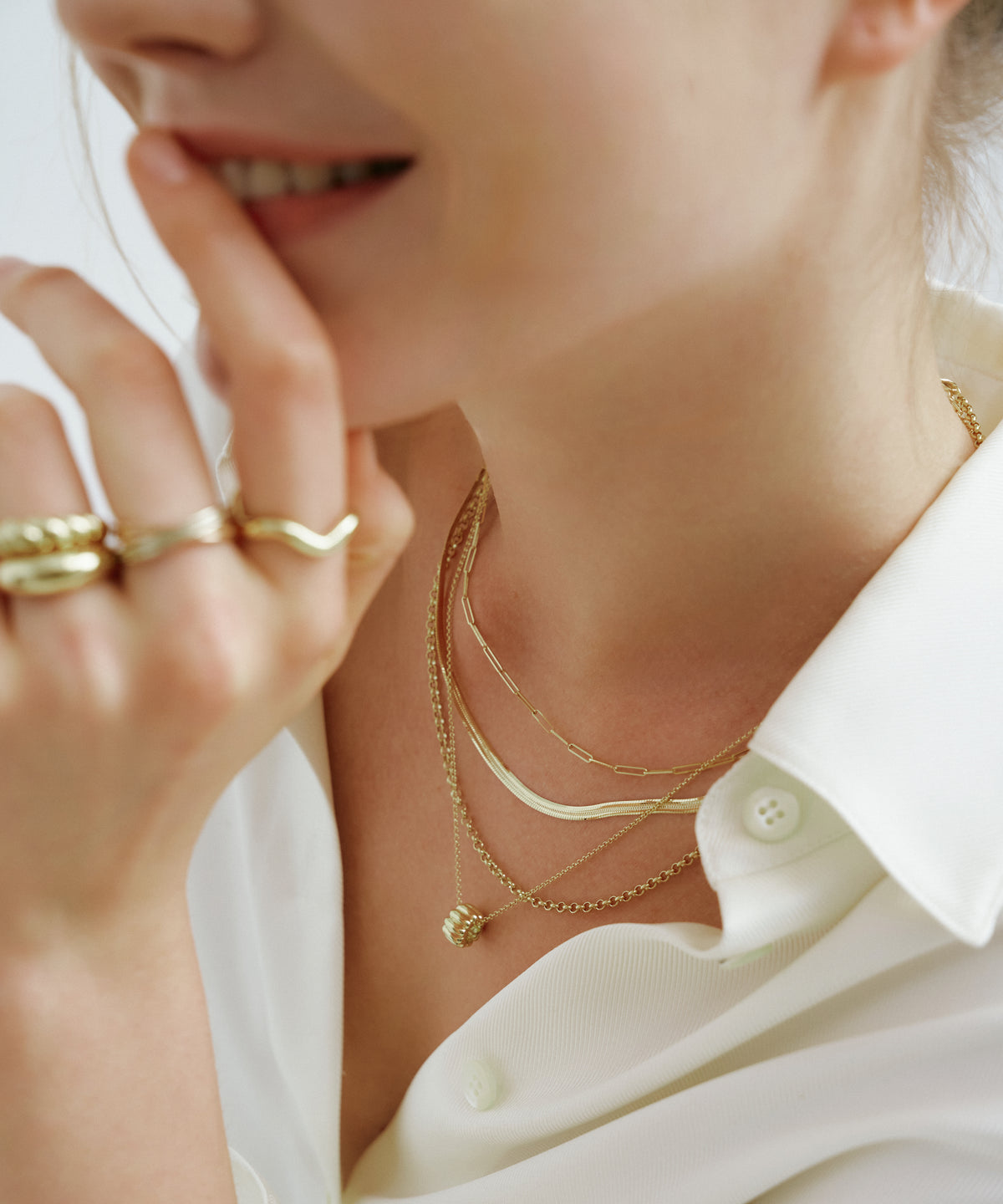 Yellow Gold | Canelé Necklace, worn, layered, hand at the lips