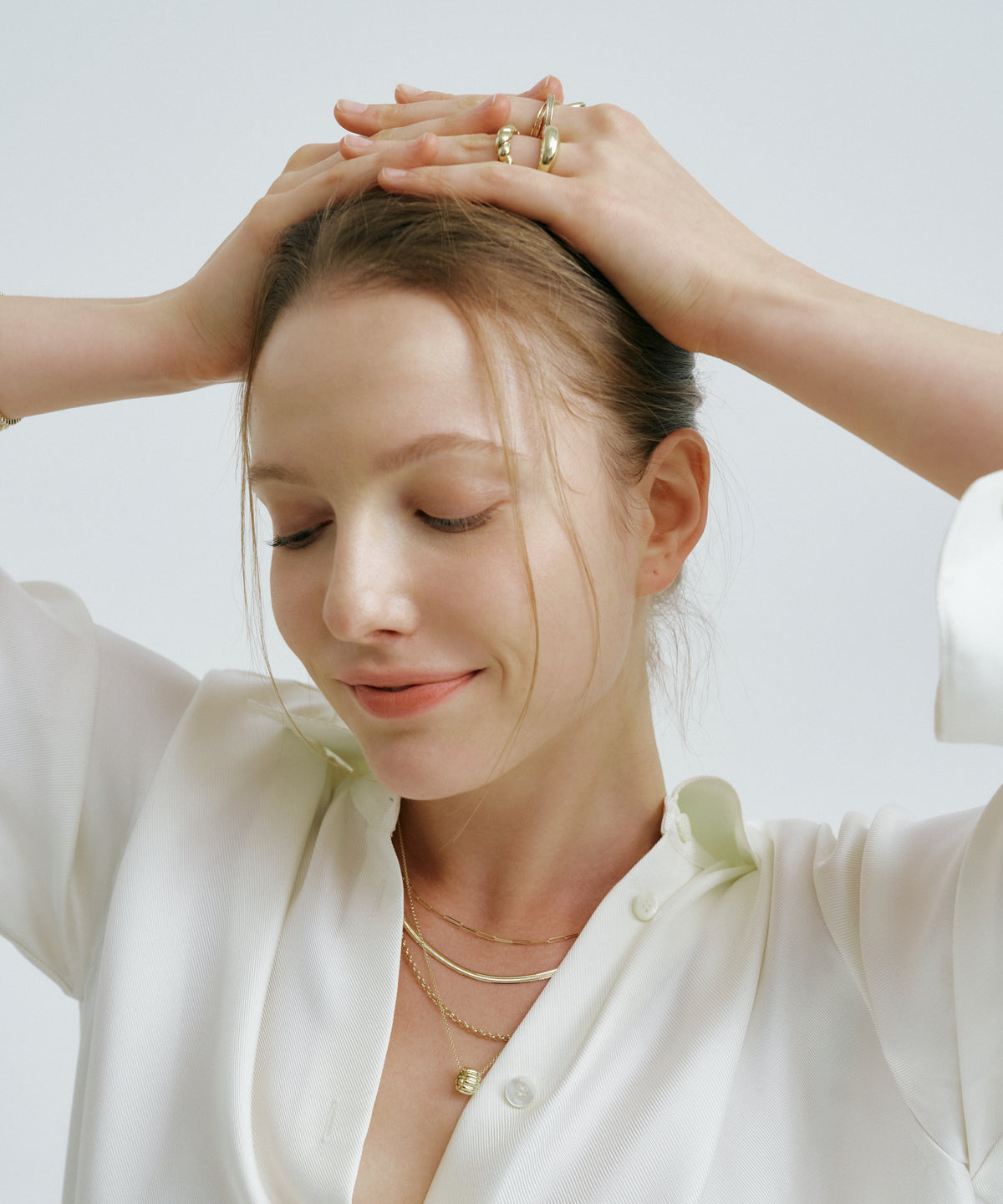 Yellow Gold | Canelé Necklace, worn, hands on the head