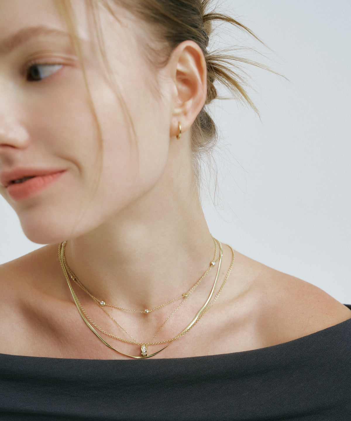 Yellow Gold | Rondelle Necklace, worn, glancing to the side
