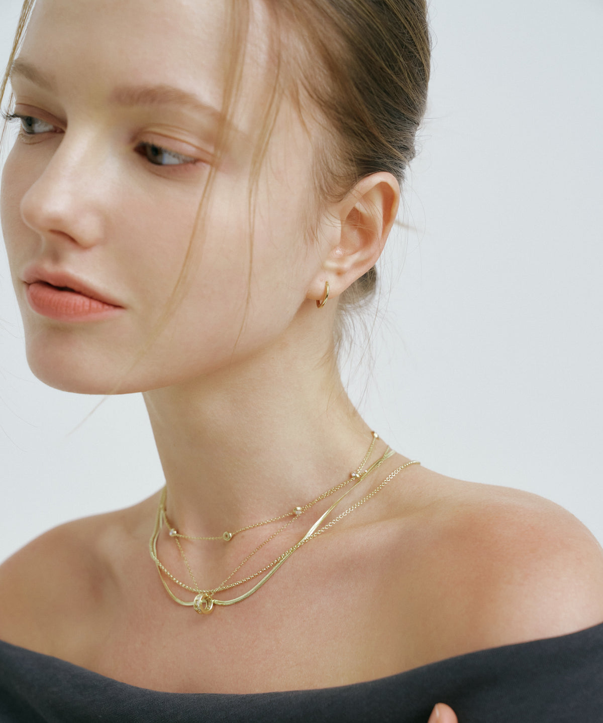 Yellow Gold | Rondelle Necklace, worn, looking down to the side