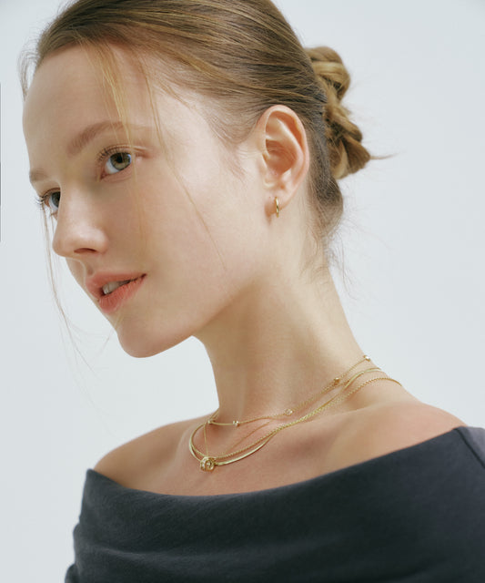 Yellow Gold | Rondelle Necklace, worn, looking over the shoulder